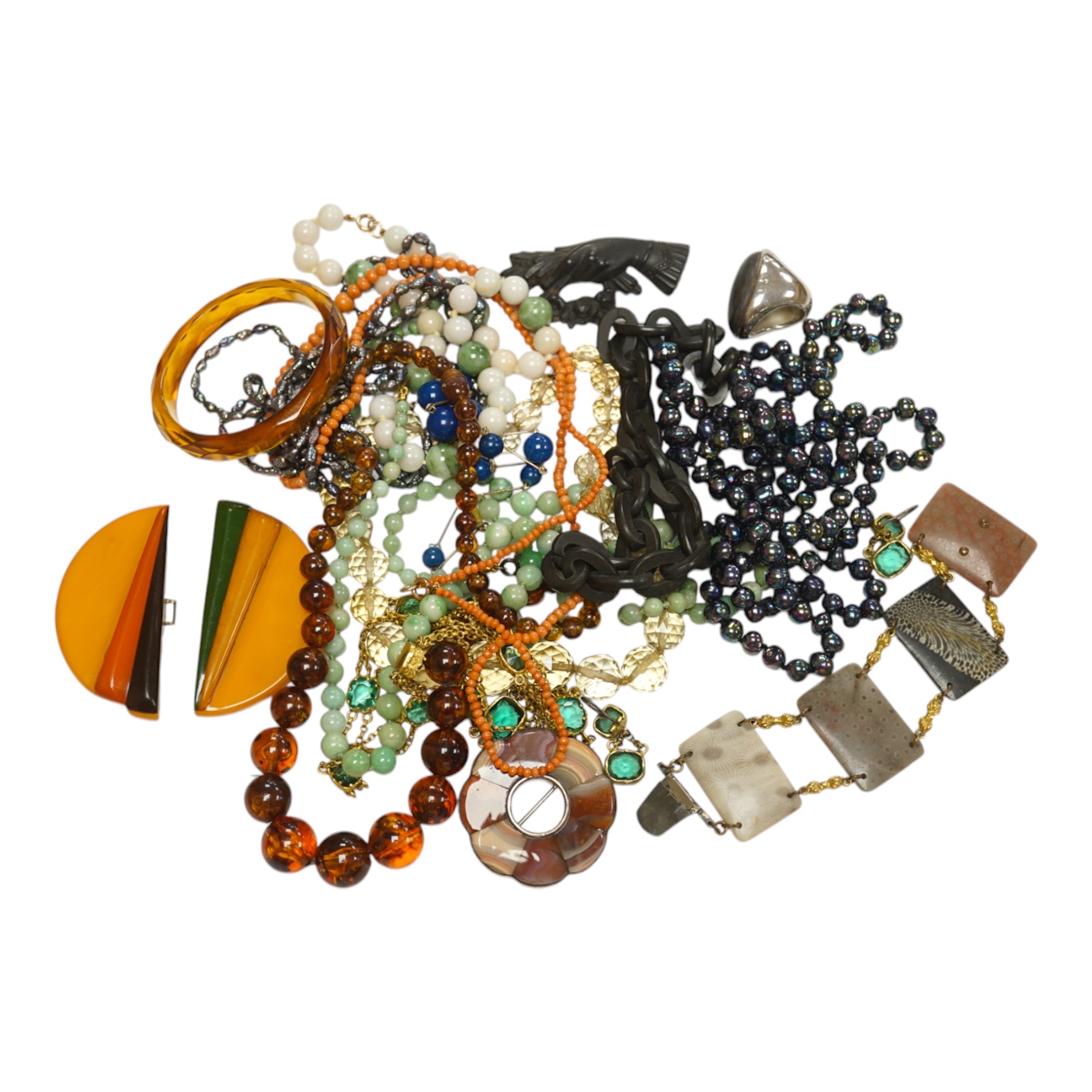 A small group of assorted costume and other jewellery including a white metal and agate set brooch, gilt metal and green paste set necklace and earrings, coral bead necklace etc. Condition - fair to good